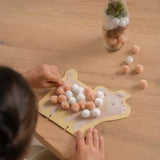 LD farm pompom plakken