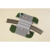 Baanovergang halve bomen