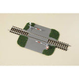 Baanovergang halve bomen